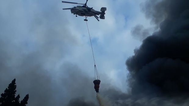 “EuroHome”da yanğını söndürmək üçün üç helikopter cəlb olundu - FOTO/VİDEO